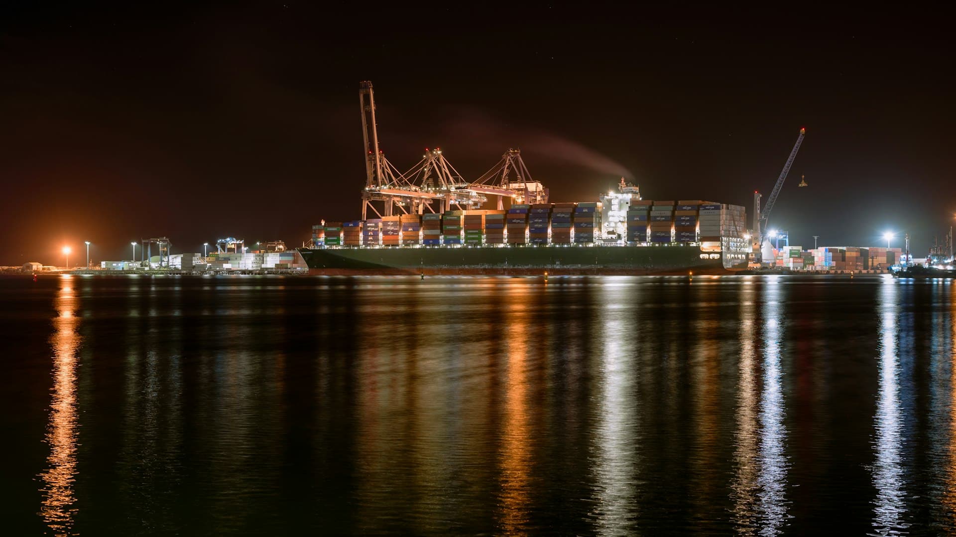 Anchored vessel under watch at dusk